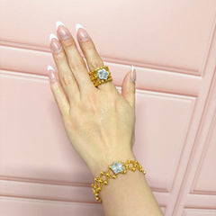 Brazalete Doble Uso Pulsera o Anillo con Flor Giratoria Plata .925 con Baño de Oro