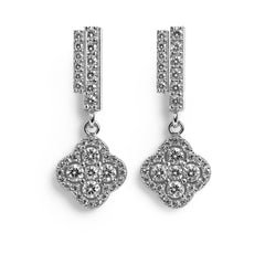 Arete Flor Mediana Inspirado Van C con Circonias Plata .925 con Rodio