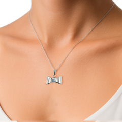 Dije de Moño Bombeado Liso de 2cm Plata .925