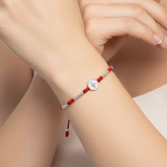 Pulsera de Hilo Rojo con Bolitas Lisas y Dije de San Benito Plata .925