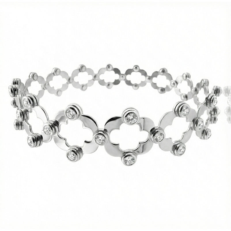 Brazalete Dos Usos Pulsera o Anillo con Silueta de Flor y Circonias Plata .925 con Baño de Rodio