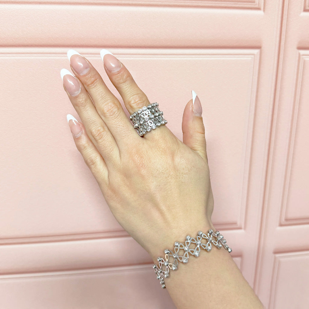 Brazalete Dos Usos Pulsera o Anillo Flor Cuatro Hojas con Circonias Plata .925 con Baño de Rodio