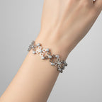 Brazalete Dos Usos Pulsera o Anillo 4 Flores con Circonias Plata .925 con Baño de Rodio