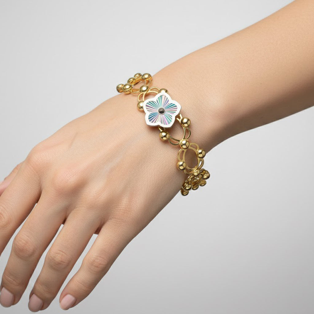Brazalete Doble Uso Pulsera o Anillo con Flor Giratoria Plata .925 con Baño de Oro