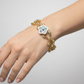 Brazalete Doble Uso Pulsera o Anillo con Flor Giratoria Plata .925 con Baño de Oro