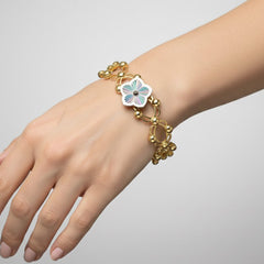 Brazalete Doble Uso Pulsera o Anillo con Flor Giratoria Plata .925 con Baño de Oro