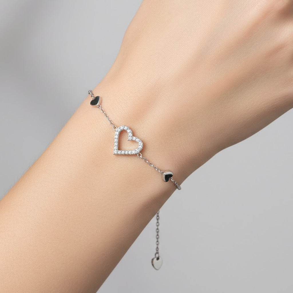 Pulsera Silueta de Corazon Con Circonias y Corazones Lisos Plata .925 con Baño de Rodio