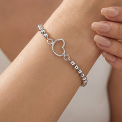 Pulsera Silueta de Corazon con Bolitas Lisas Plata .925