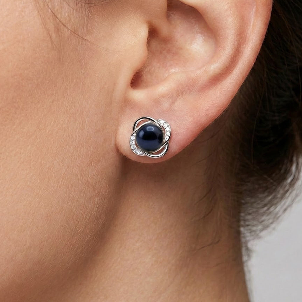 Arete Broquel Flor co Perla Río, Plata .925 con Baño de Rodio