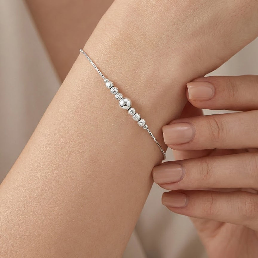 Pulsera Ajustable con Bolitas Diamantadas y Lisa Plata .925