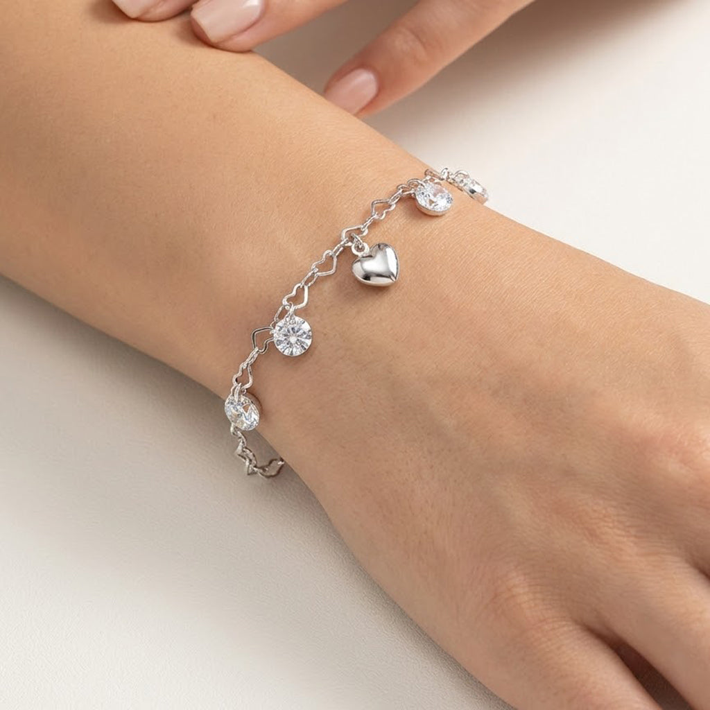 Pulsera Corazones con Swarovski y Dije de Corazón Bombeado Plata .925