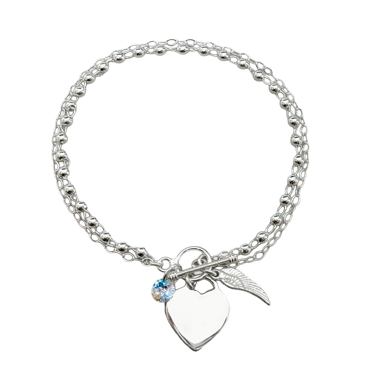 Pulsera Swarovski con Dijes de Ala y corazón Plata .925
