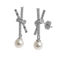 Arete inspirado Tiff X con circoinias y perla Plata .925 con Baño de Rodio