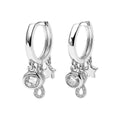 Arracada Huggies Figuras con Circonia y Micro Circonias Plata .925 con Baño de Rodio