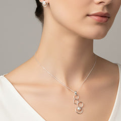 Juego Perla Natural con Siluetas de Círculos Plata .925