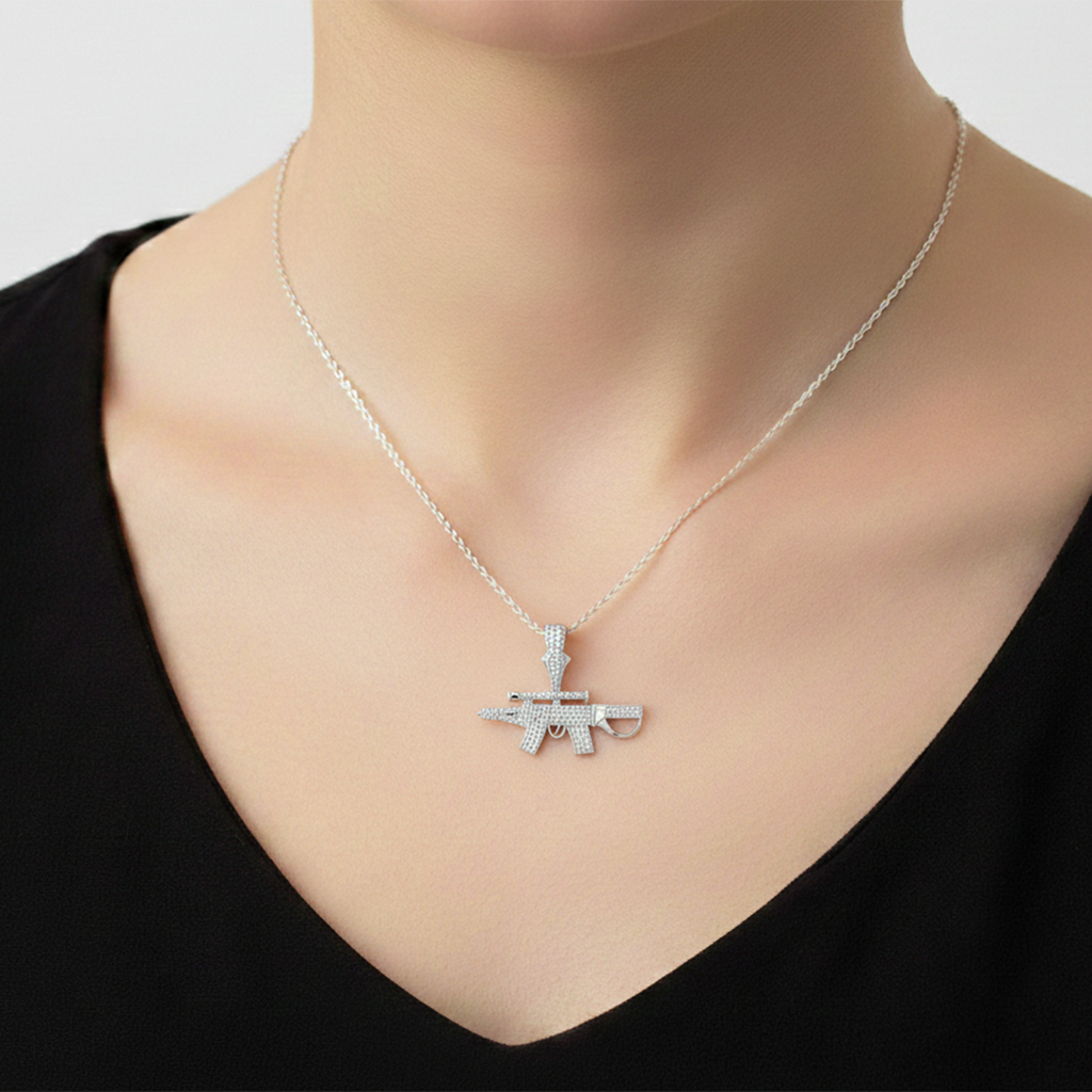 Dije de Arma con Micro Circonias Plata .925 con Baño de Rodio