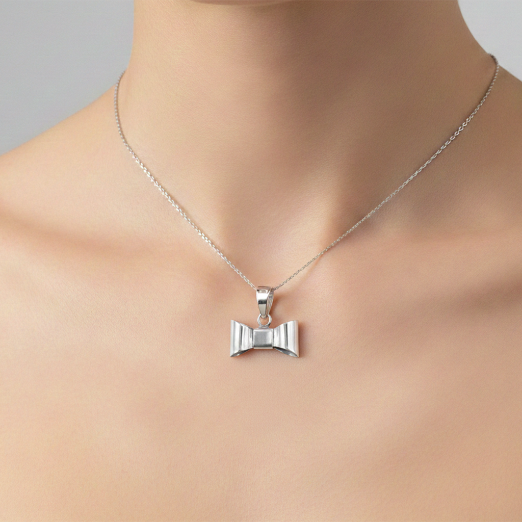 Dije de Moño Bombeado Liso de 2cm Plata .925