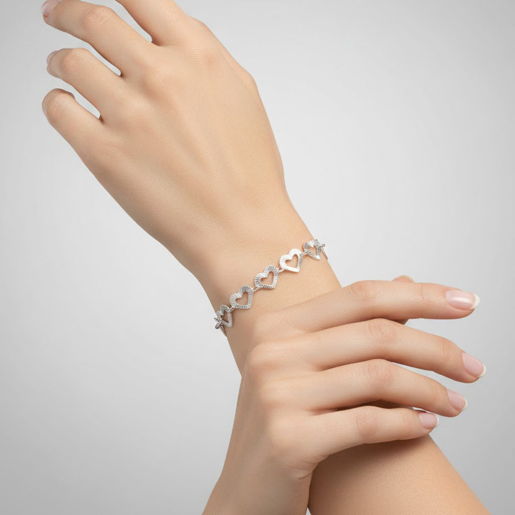 Pulsera Silueta de Corazones Diamantados Plata .925
