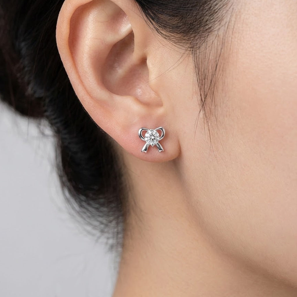 Arete Broquel Moño con Circonia Plata .925 con Baño de Rodio