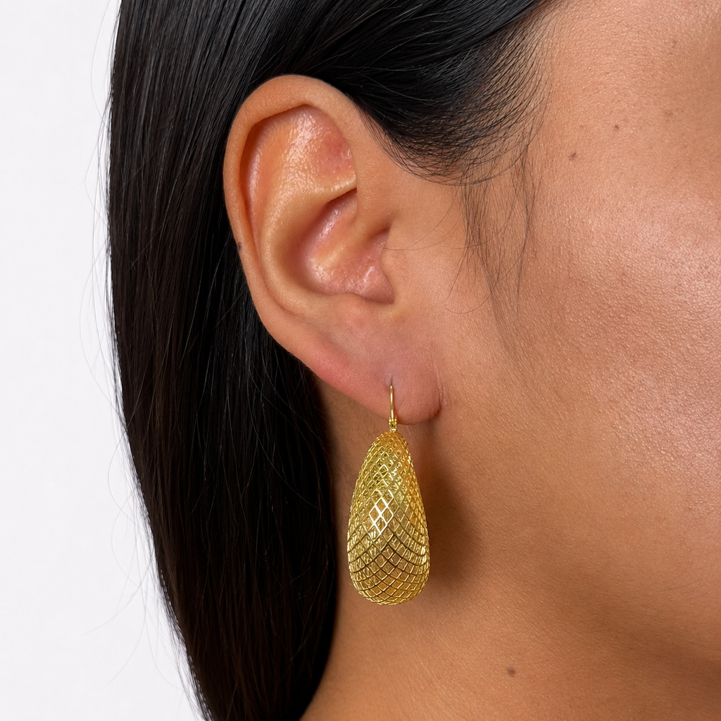 Arracada Filigrana Oval Bolsita Colección Esencia Plata .925 con Baño de Oro 18K