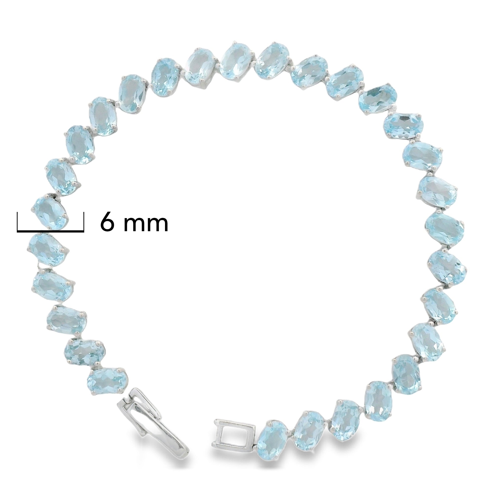 Pulsera Piedra Preciosa Óvalo Topacio Azul Plata .925 con Baño de Rodio.