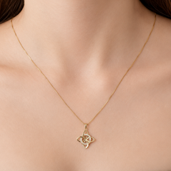 Dije Nudo de Bruja con Micro Circonias Oro 10K