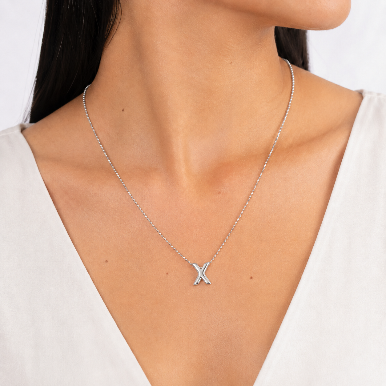 Collar Letra X Plata .925 con Baño de Rodio
