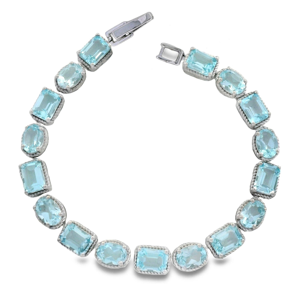 Pulsera Piedras Preciosas Óvalos y Rectángulos Aguamarina Azul,  Plata .925 con Baño de Rodio. Broche