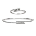 Juego Messik 1:1 Brazalete y Anillo Cruzado con Circonias Plata .925 con Baño de Rodio
