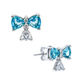 Arete Broquel Pan 1:1 Bridgerton Moño Circonia Azul con Circonia Colgante, Plata .925 con Baño de Rodio